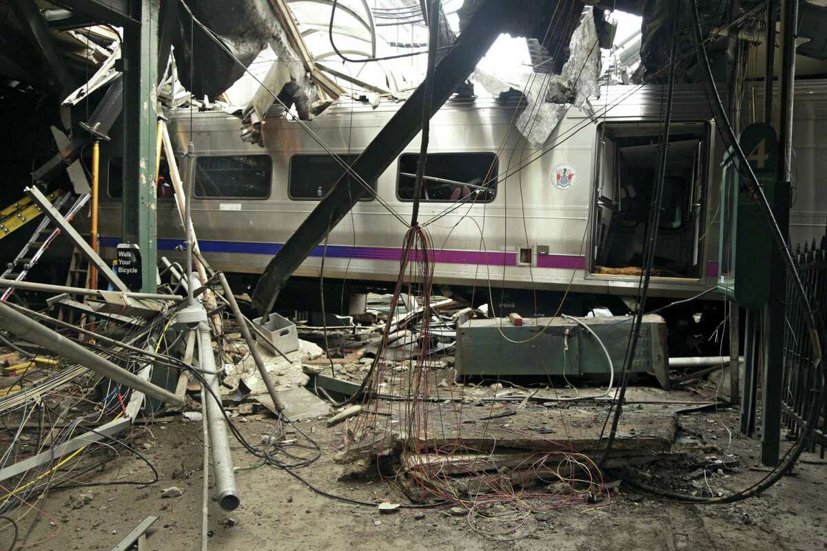 This Oct. 1, 2016, file photo provided by the National Transportation Safety Board shows damage done to the Hoboken Terminal in Hoboken, N.J., after the Sept. 29 commuter train crash. Lawmakers investigating September’s deadly New Jersey Transit train crash could finally get a chance to question top agency officials who skipped out on an oversight hearing last month. NJ Transit says new executive director Steve Santoro and other key leaders will testify before the legislative committee on Friday, Nov. 4, 2016.