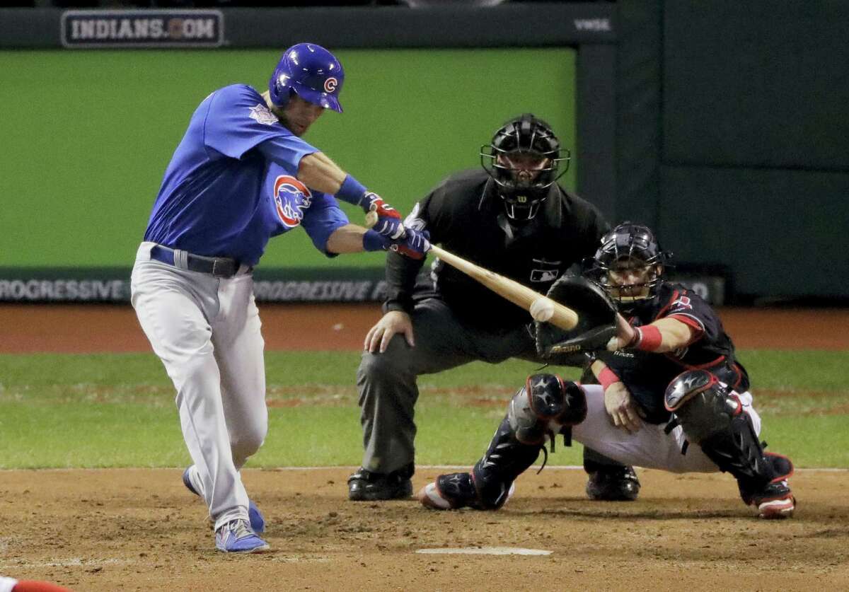 Chicago’s Ben Zobrist watches his RBI-double against the Cleveland Indians during the 10th inning of Game 7 of the World Series.