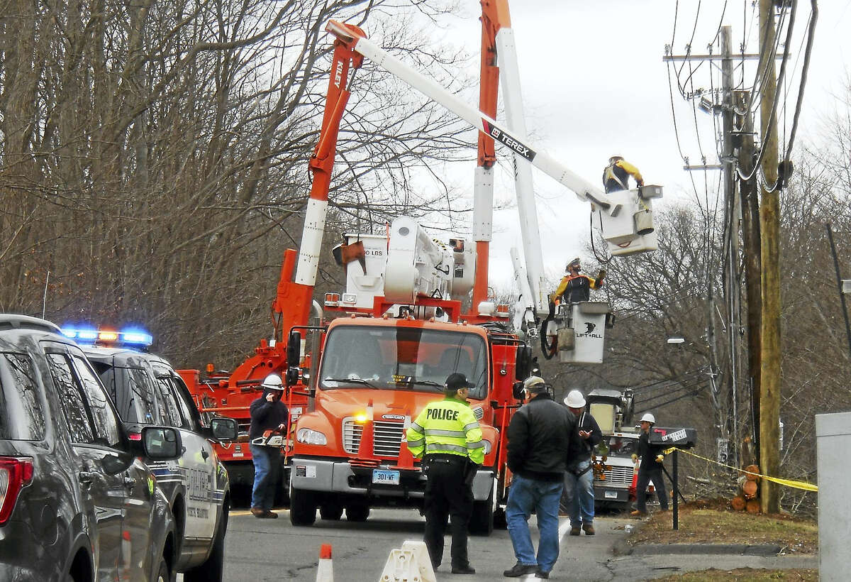 Part of Route 17 was shut down north of Mansfield Drive in North Branford late Thursday morning as crews wroked to repair damage from the strong storm that swept through Greater New Haven the night before.