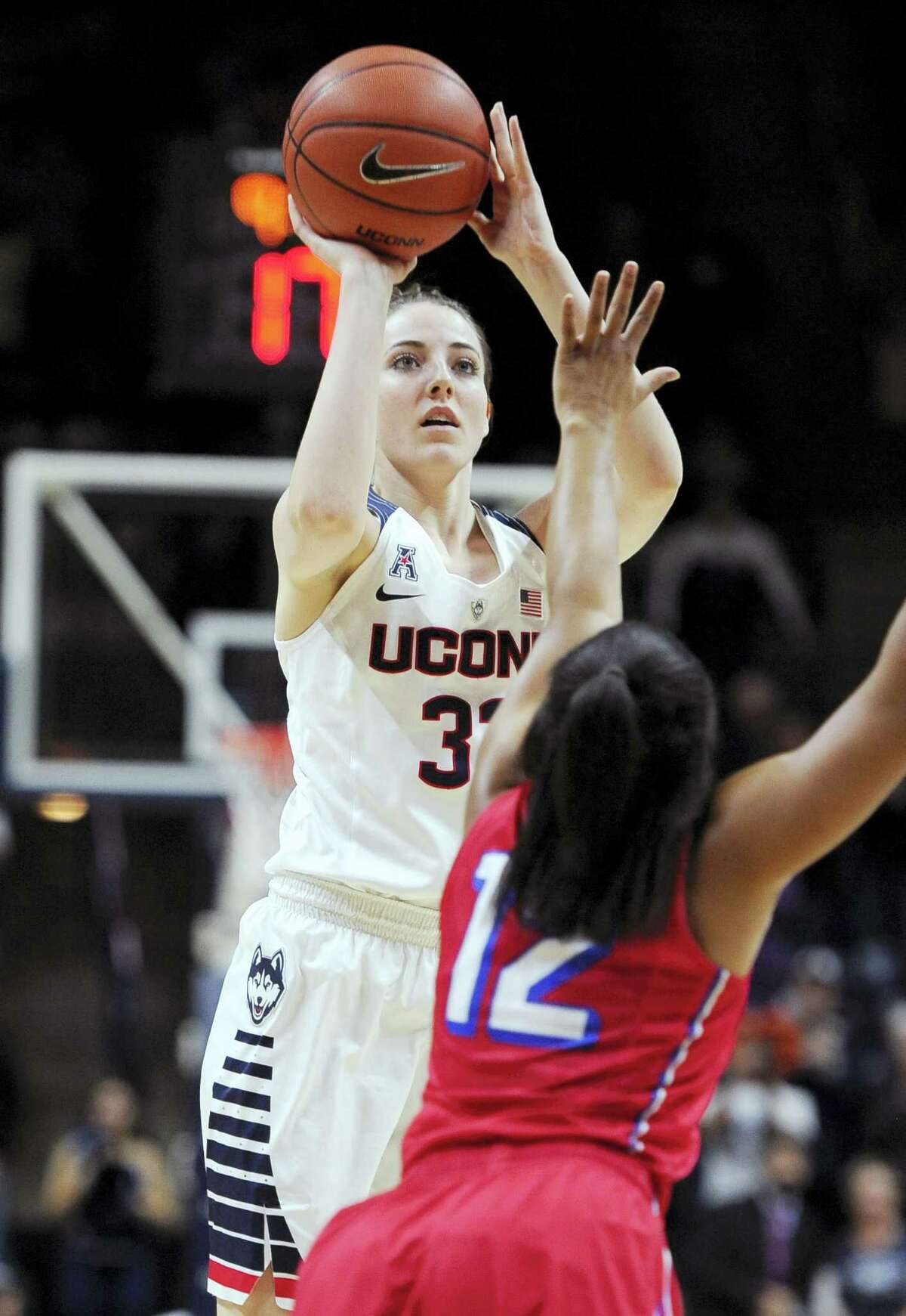 UConn freshman Katie Lou Samuelson shoots over SMU’s Morgan Bolton during the first half Wednesday en route to tying her career high with 21 points.