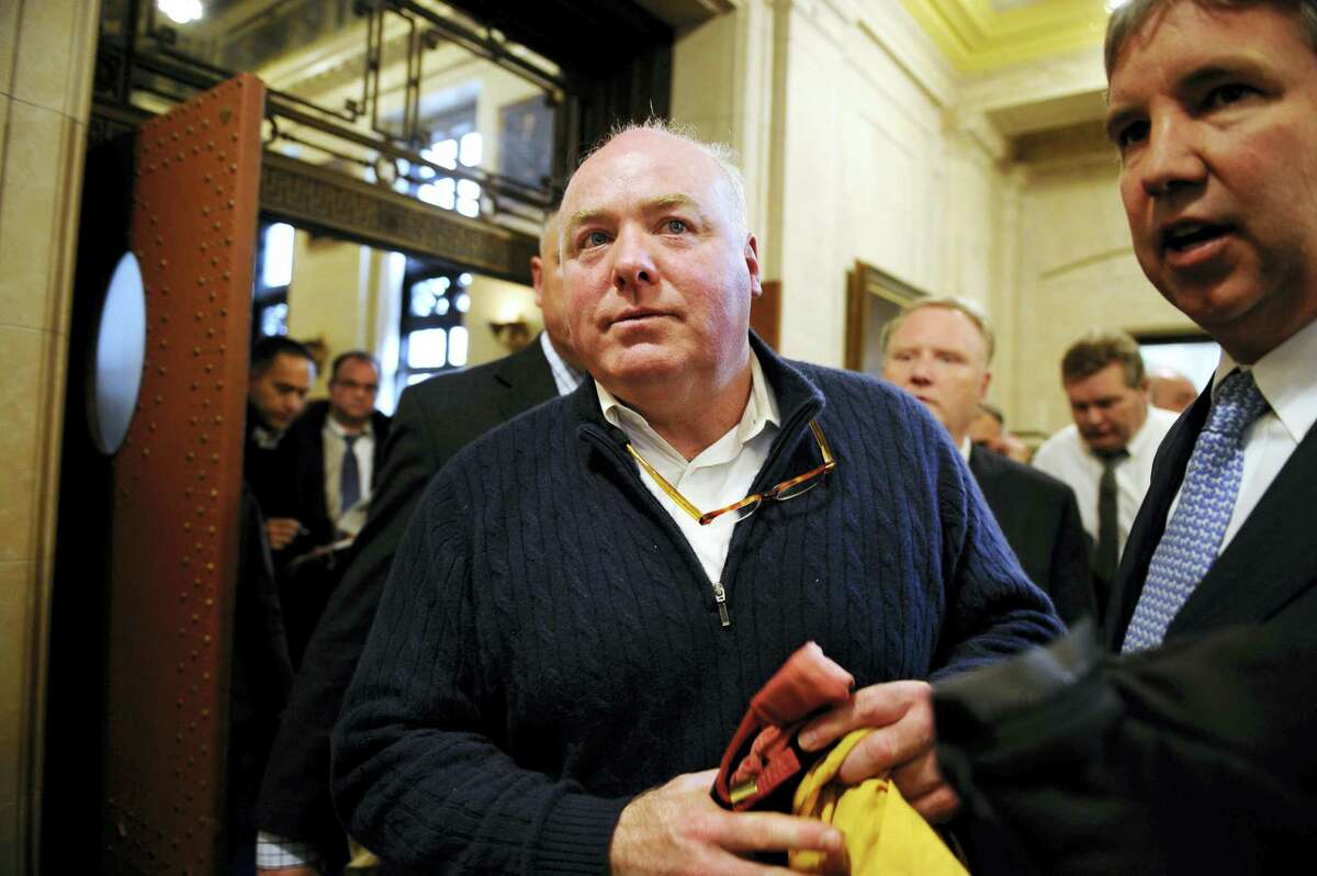 Michael Skakel leaves the state Supreme Court after his hearing, Wednesday, Feb. 24, 2016, in Hartford. State prosecutors asked the state Supreme Court to reinstate the 2002 murder conviction against Kennedy cousin Skakel in the bludgeoning death of Martha Moxley when they were teenage neighbors in wealthy Greenwich.