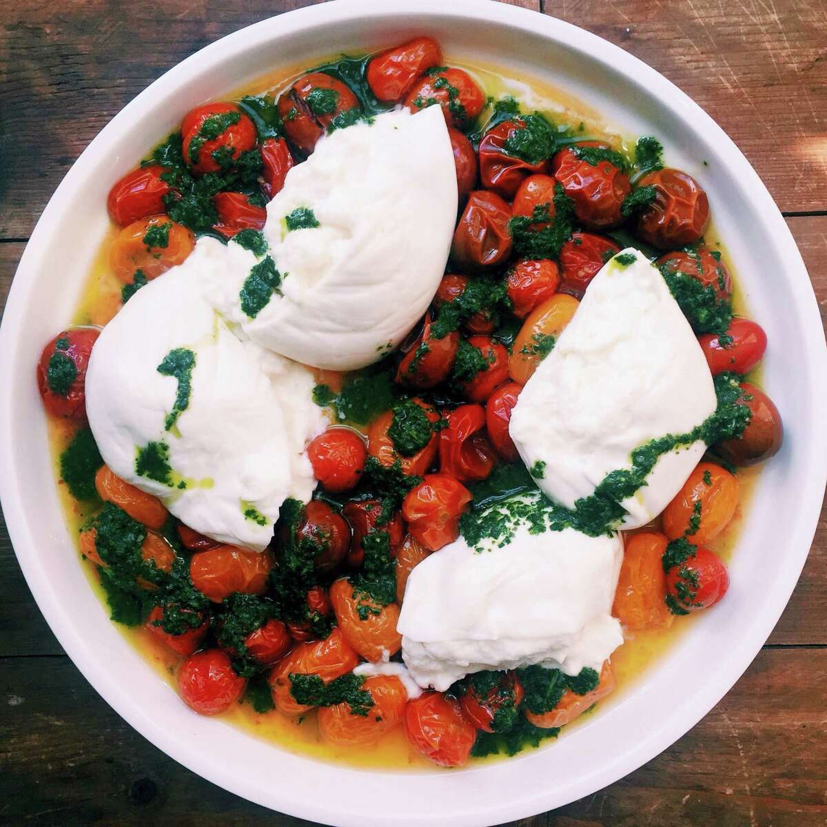 If you have never tried burrata, go out and find some and then make roasted cherry tomatoes with burrata and basil oil.