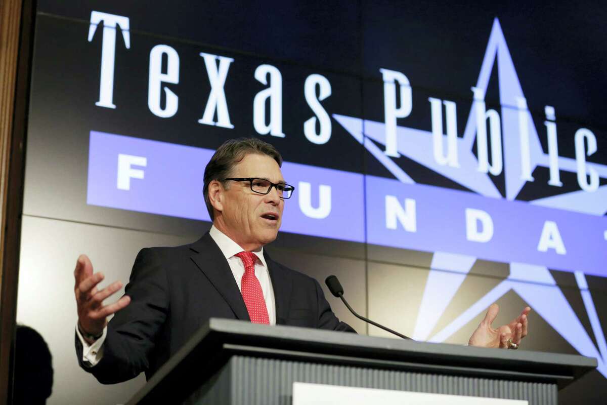 Former Texas Gov. Rick Perry speaks during a news conference Wednesday in Austin, Texas.