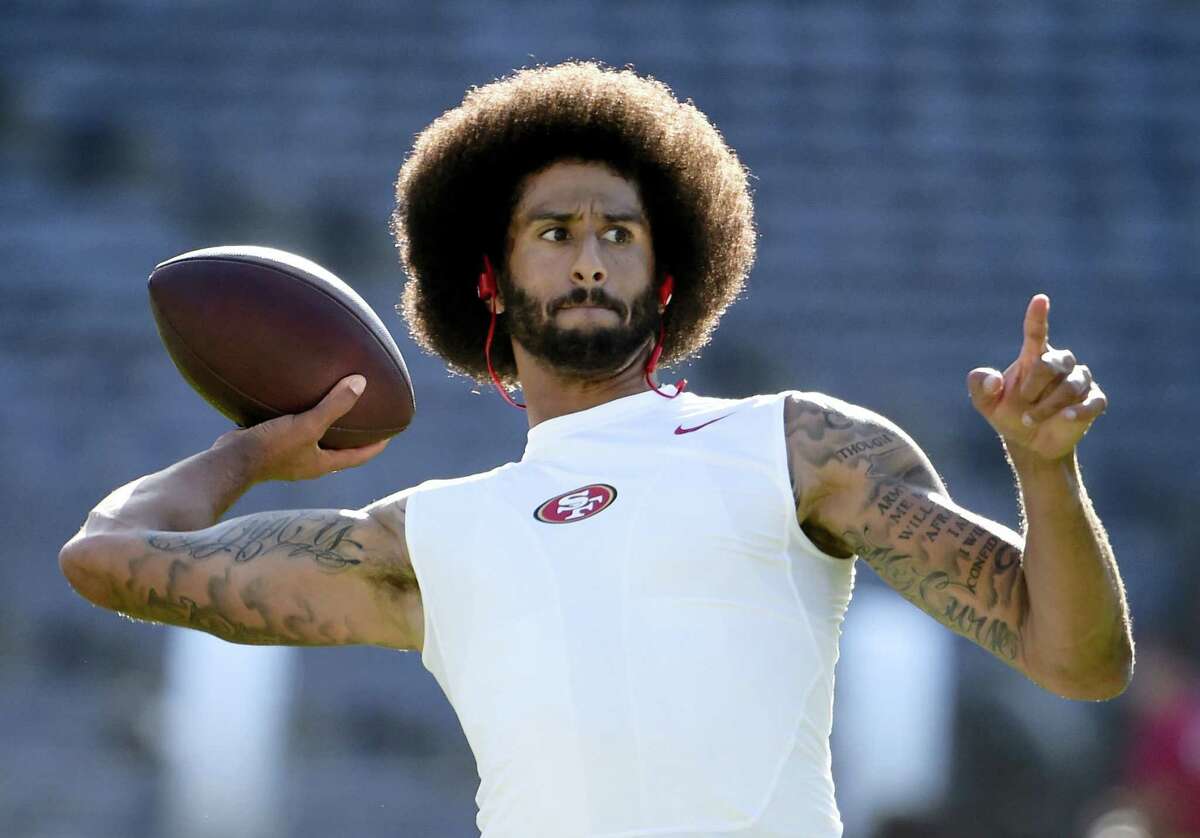 San Francisco 49ers quarterback Colin Kaepernick warms up prior to Thursday’s preseason game against the Chargers in San Diego.