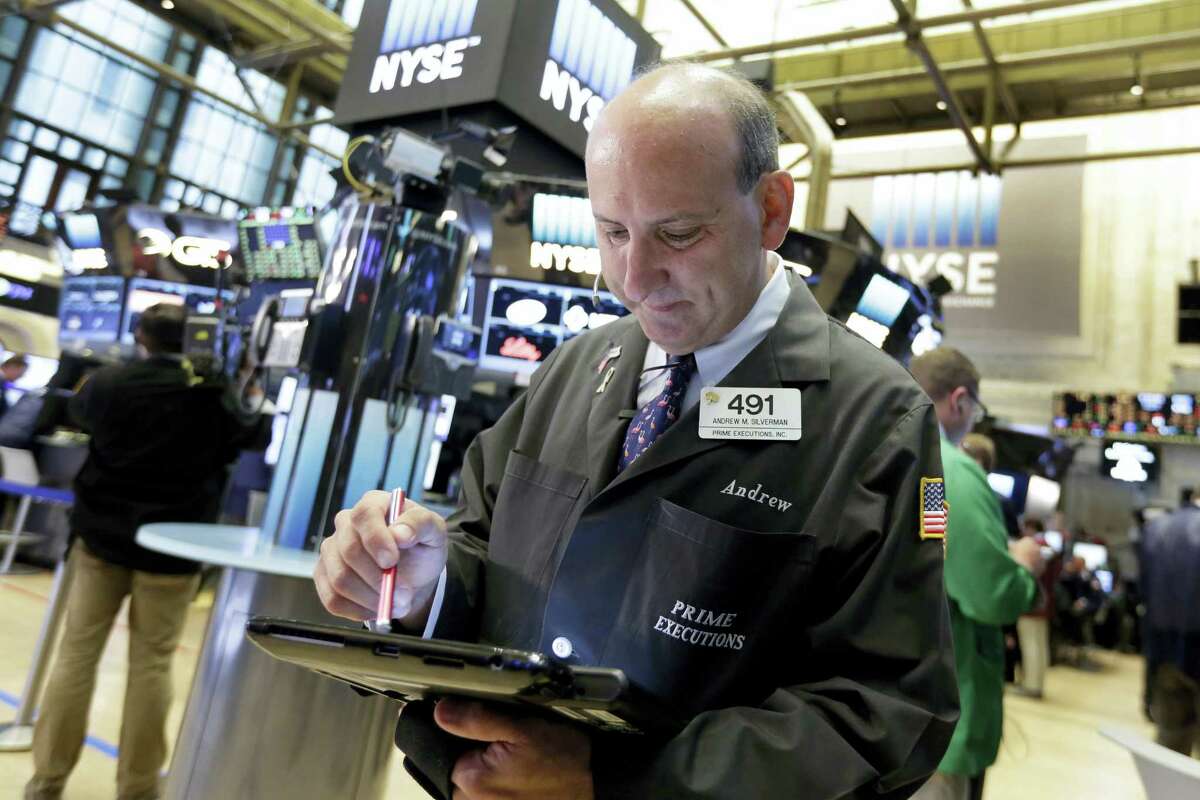 Trader Andrew Silverman works on the floor of the New York Stock Exchange Wednesday.