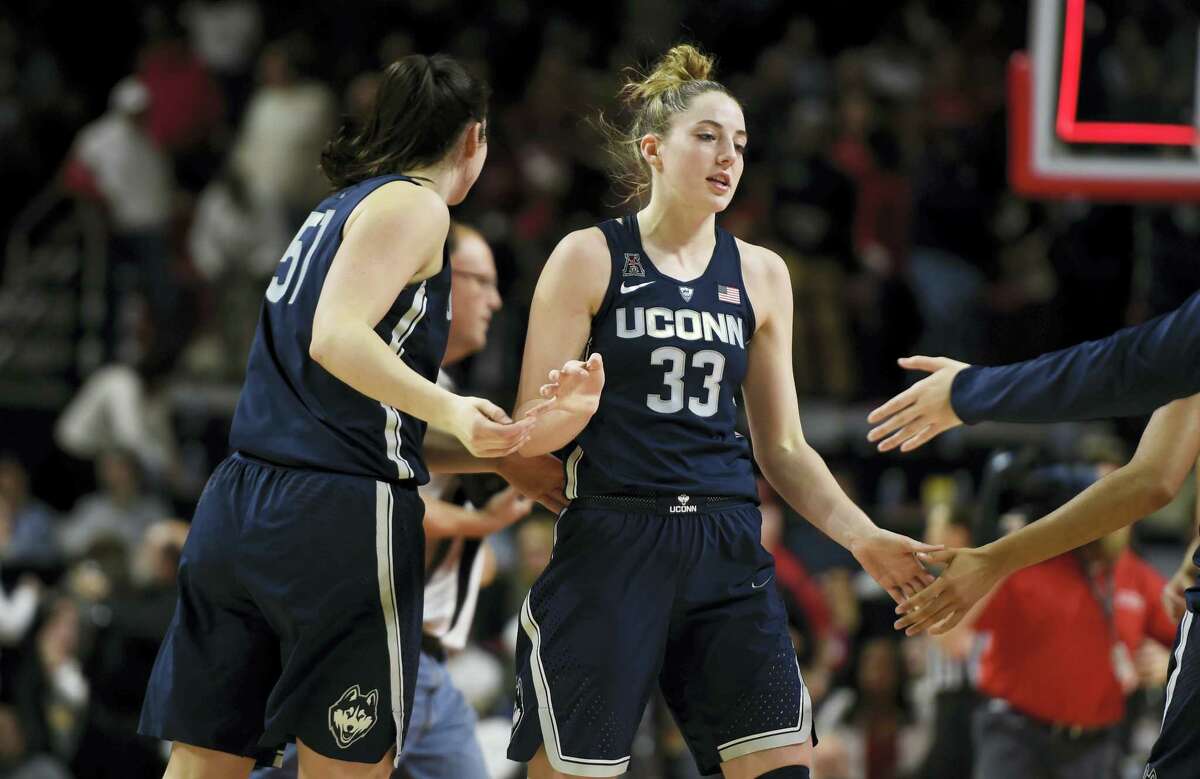 UConn’s Katie Lou Samuelson (33) is congratulated after the Huskies beat Maryland 87-81 on Thursday night in College Park, Md.