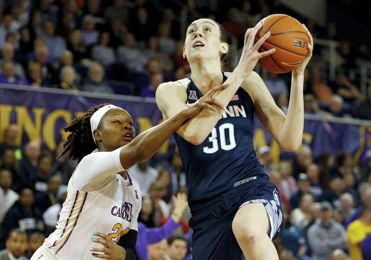 UConn’s Breanna Stewart (30) drives the ball past East Carolina I’Tiana Taylor during Saturday’s game.