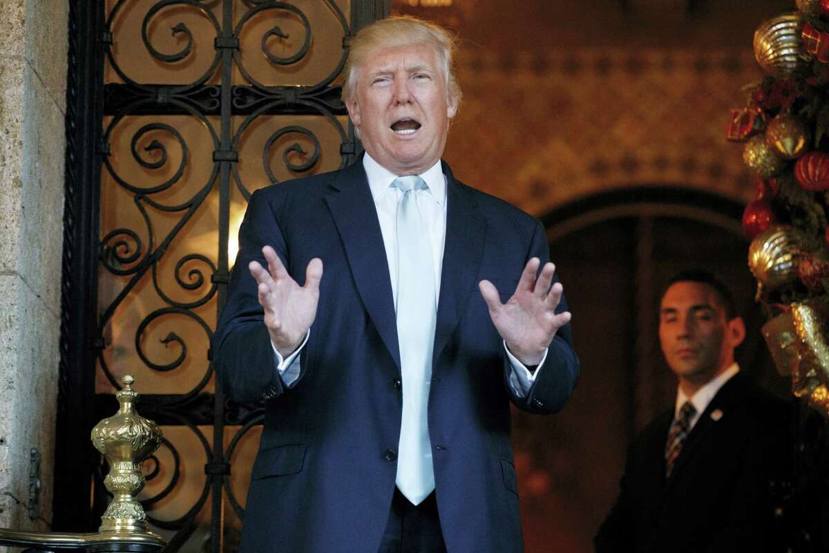 President-elect Donald Trump speaks to reporters at Mar-a-Lago, Wednesday, Dec. 28, 2016, in Palm Beach, Fla.
