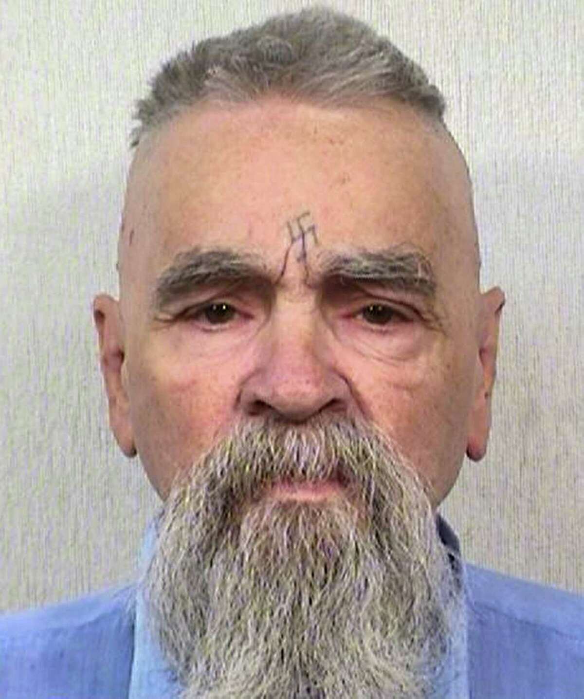 This Oct. 8, 2014, photo provided by the California Department of Corrections shows 80-year-old serial killer Charles Manson. A marriage license has been issued for Manson to wed 26-year-old Afton Elaine Burton, who left her Midwestern home nine years ago and moved to Corcoran, California to be near him. Burton, who goes by the name “Star,” told the AP that she and Manson will be married next month.