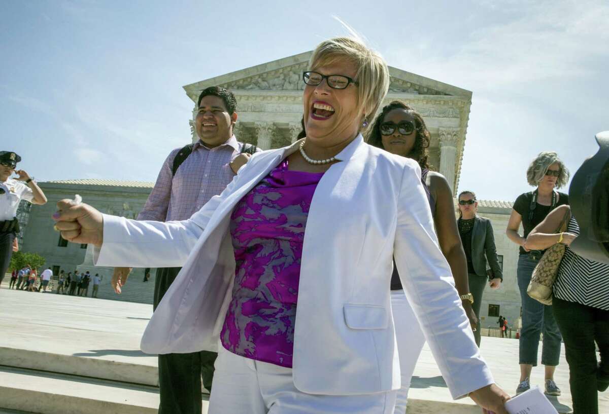 Amy Hagstrom Miller, founder of Whole Woman’s Health, a Texas women’s health clinic that provides abortions, rejoices as she leaves the Supreme Court in Washington Monday as the justices struck down the Texas law known as HB2.