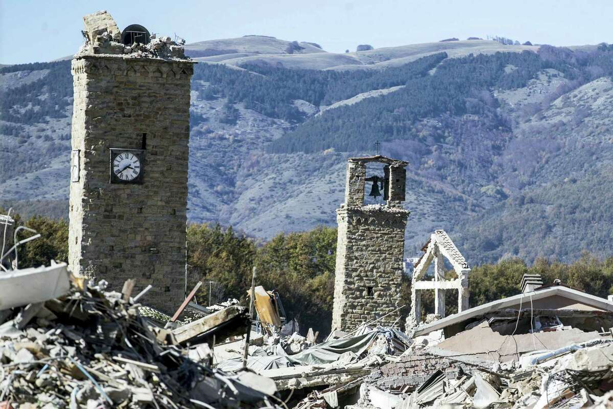 A view of the town of Amatrice, with the bell tower visible at left, after an earthquake with a preliminary magnitude of 6.6 struck central Italy on Oct. 30, 2016. A powerful earthquake rocked the same area of central and southern Italy hit by quake in August and a pair of aftershocks last week, sending already quake-damaged buildings crumbling after a week of temblors that have left thousands homeless.