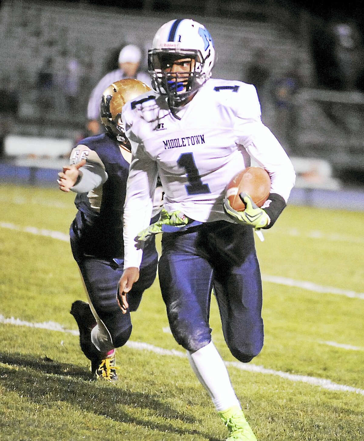 Middletown senior quarterback Tyshaun James rushed for 167 yards with three touchdowns against Newington.