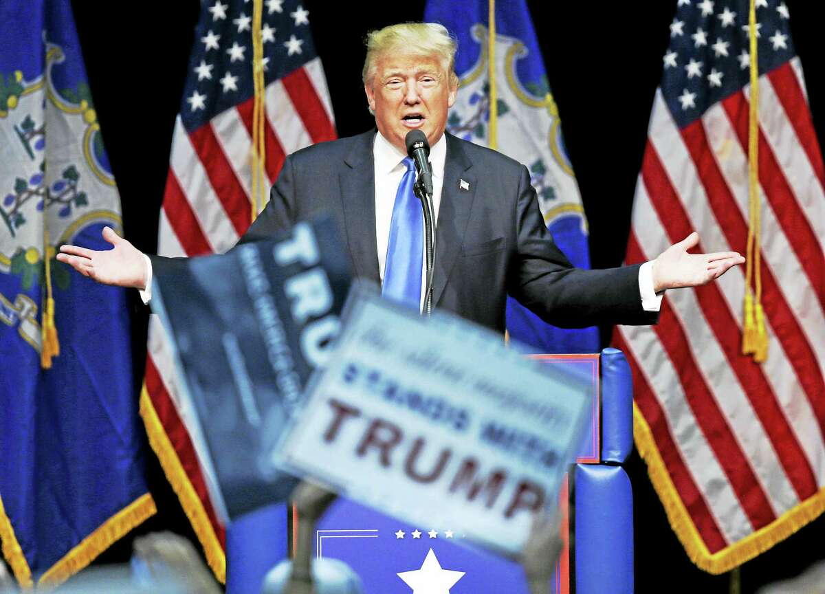 Republican presidential candidate Donald Trump addresses supporters at a campaign event at Crosby High School in Waterbury Saturday, April 23, 2016.