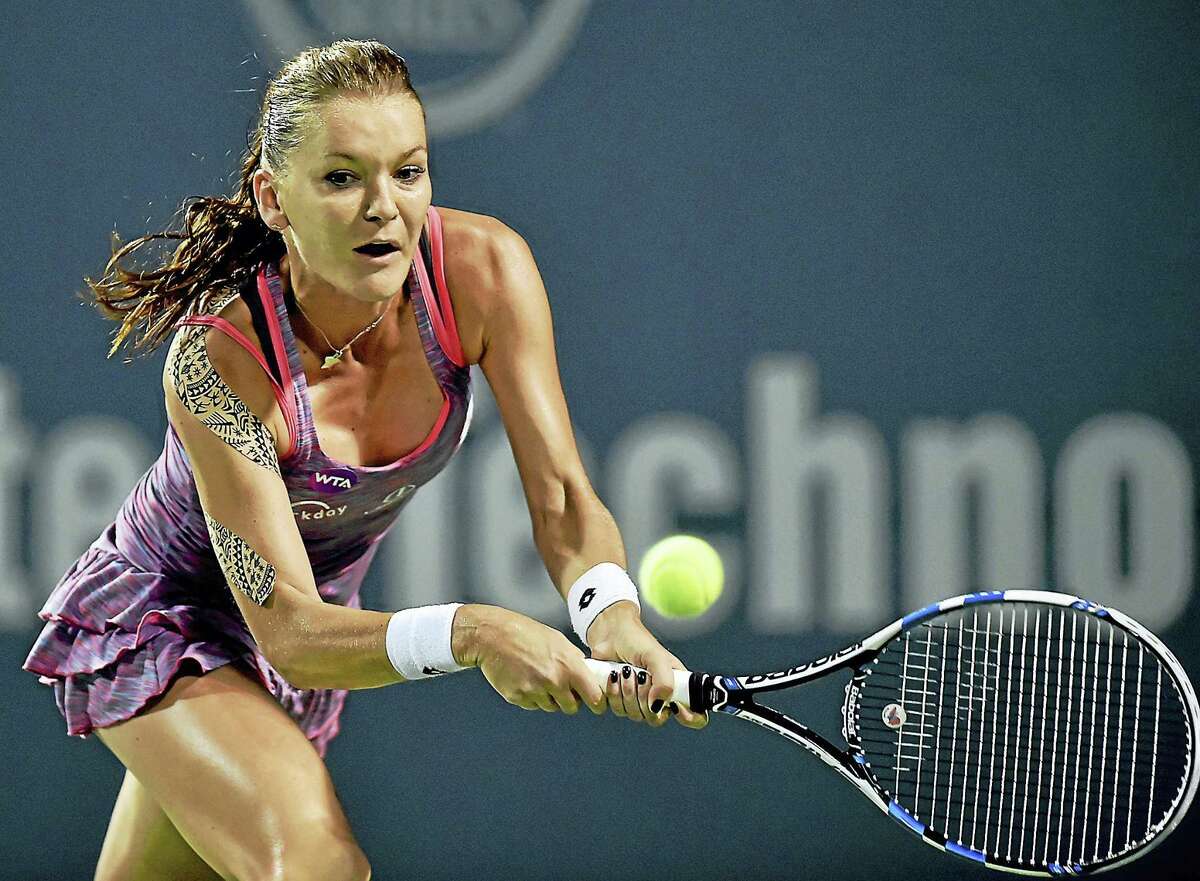 Poland’s Agnieszka Radwanska defeated Belgium’s Kristen Flipkens in a quarterfinal match at the Connecticut Open on Thursday.