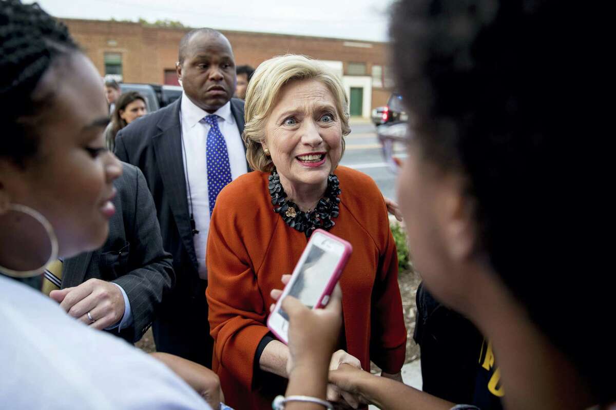Democratic presidential candidate Hillary Clinton greets early voters at the Leonard J. Kaplan Center for Wellness at the University of North Carolina at Greensboro in Greensboro, N.C., Thursday, Oct. 27, 2016.