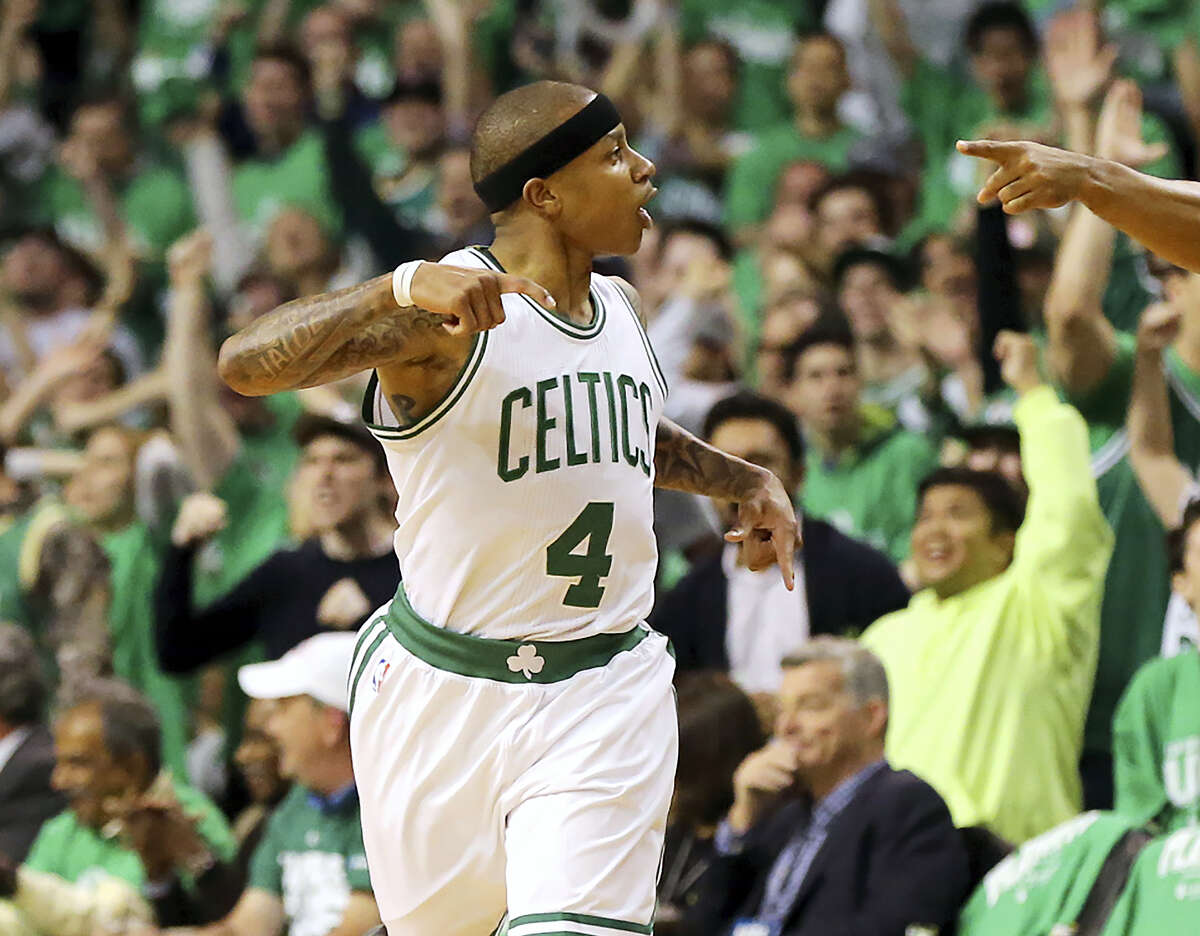 Isaiah Thomas reacts after hitting a 3-pointer against the Hawks on Friday.