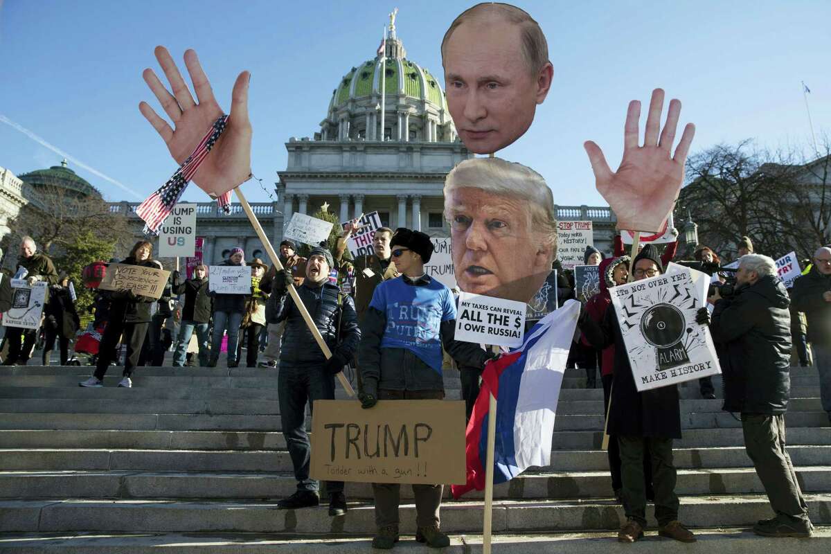 Protesters demonstrate ahead of Pennsylvania’s 58th Electoral College at the state Capitol in Harrisburg, Pa. After the election that saw the winner of the popular vote fall short of the U.S. presidency, legislators in states including Connecticut, Pennsylvania, Ohio and New Mexico said they plan to introduce legislation that would require their state’s Electoral College voters cast ballots for the presidential candidate who earns the most votes nationwide, regardless of the statewide results.