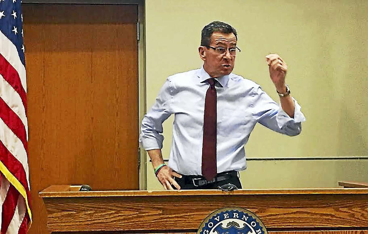 Gov. Dannel P. Malloy speaks at a town forum in Middletown’s Council Chambers Tuesday, addressing his proposed budget reductions and how the state is adapting to the changing economy.
