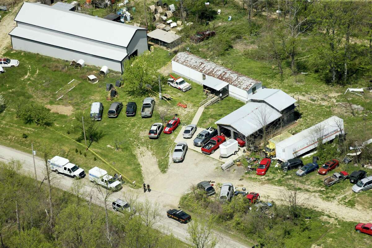 This aerial photo shows one of the locations being investigated in Pike County, Ohio, as part of an ongoing homicide investigation, Friday, April 22, 20156. Several people were found dead Friday at multiple crime scenes in rural Ohio, and at least most of them were shot to death, authorities said. No arrests had been announced, and it’s unclear if the killer or killers are among the dead.