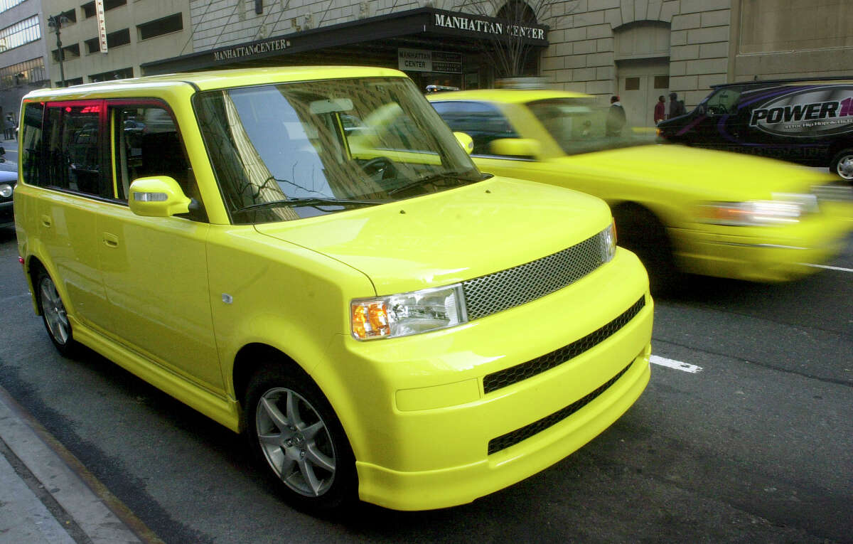In this April 16, 2005, photo, a solar yellow Scion limited-production xB Release Series 2.0 is parked in Manhattan as part of a corporate promotion in New York.