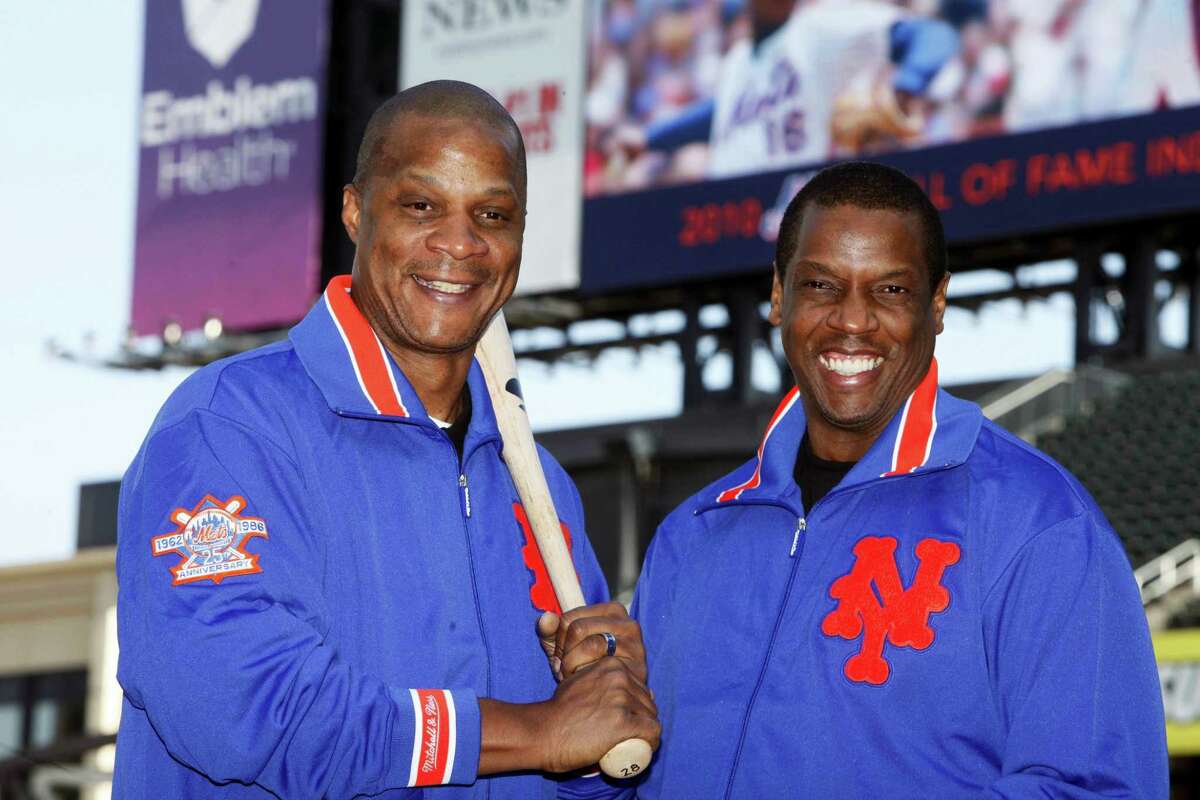 This file photo shows former New York Mets’ players Dwight Gooden, right, and Darryl Strawberry posing at Citi Field.