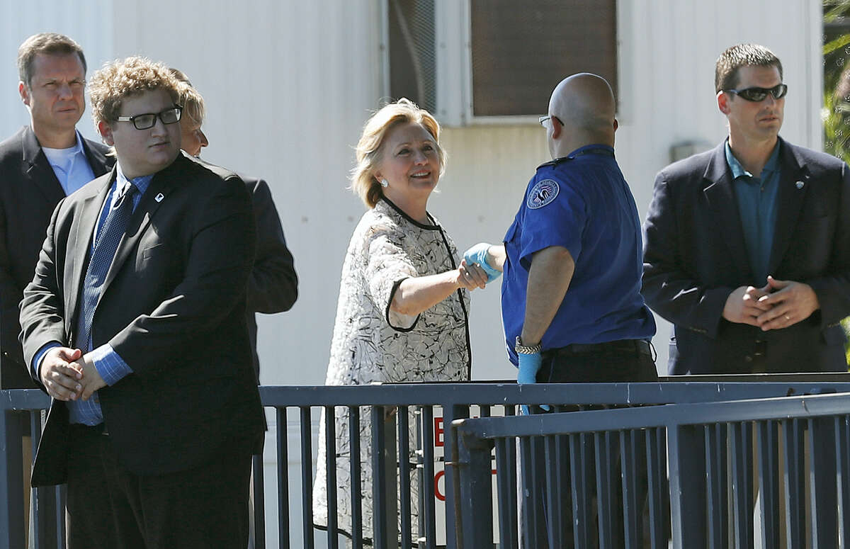 Democratic presidential candidate Hillary Clinton greets people as she arrives at Provincetown Municipal Airport in Provincetown, Mass. on Aug. 21, 2016. Clinton is traveling to a fundraiser at the Pilgrim Monument and Provincetown Museum in Provincetown.