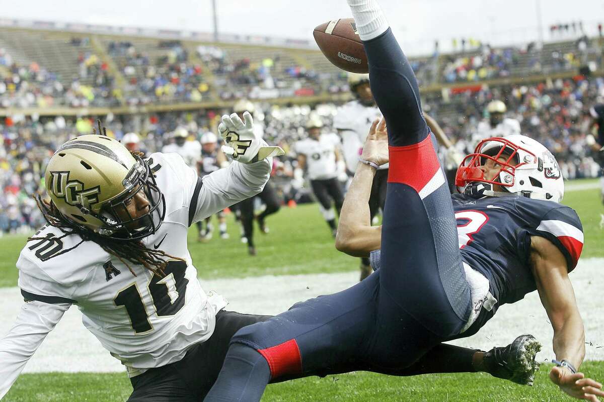 Central Florida defensive back Shaquill Griffin breaks up a pass in the end zone intended for ucONN wide receiver Brian Lemelle during the first quarter Saturday.