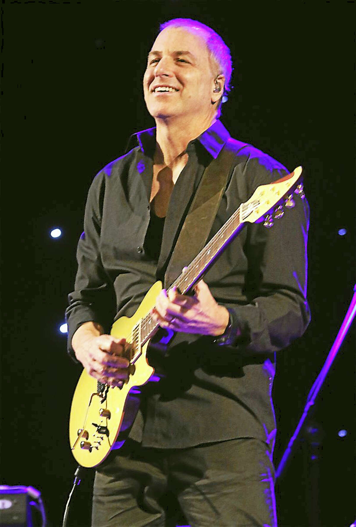 Photo by John AtashianGuitarist and singer Russ Freeman is shown performing on stage during a concert with The Rippingtons at Infinity Hall in Hartford on Oct. 13, 2016. To view all of the upcoming concerts coming to Infinity Hall in Hartford and Norfolk, visit www.infinityhall.com