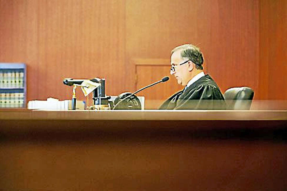 Judge Thomas Moukawsher reads his decision.