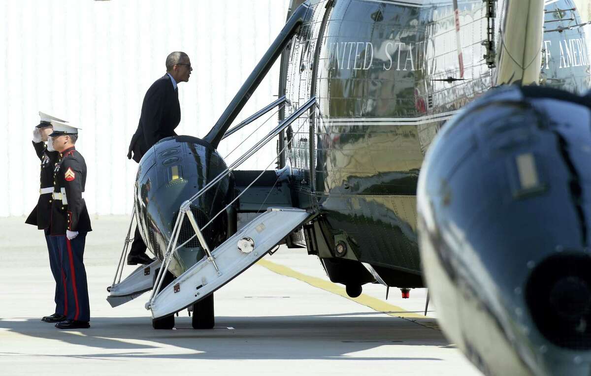 President Barack Obama boards Marine One at Santa Monica Municipal Landing Zone in Santa Monica, Calif., as he begins his travel back to Washington, Tuesday, Oct. 25, 2016. Obama is returning to Washington after spending a few days in Nevada and California campaigning for Democratic presidential candidate Hillary Clinton.