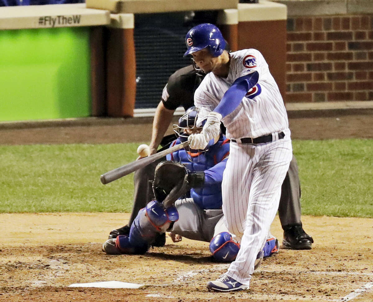 Chicago Cubs catcher Willson Contreras (40) hits a home run during the fourth inning of Game 6 of the National League baseball championship series against the Los Angeles Dodgers on Oct. 22, 2016 in Chicago.