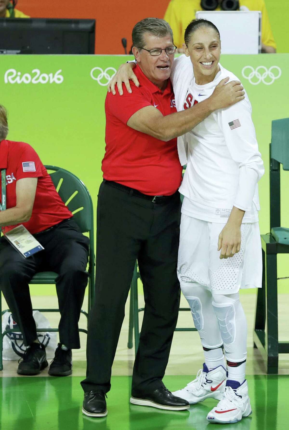Diana Taurasi, right, celebrates with head coach Geno Auriemma.