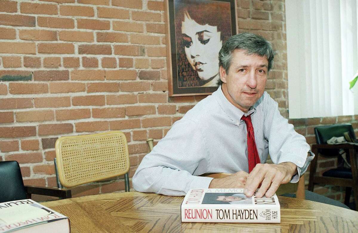 In this June 6, 1988 photo, Tom Hayden talks about his new book, “Reunion,” during a interview at his office in Santa Monica, Calif. Hayden, the famed 1960s anti-war activist who moved beyond his notoriety as a Chicago 7 defendant to become a California legislator, author and lecturer, has died. He was 76. His wife, Barbara Williams, says Hayden died on Oct. 23, 2016 in Santa Monica of a long illness.