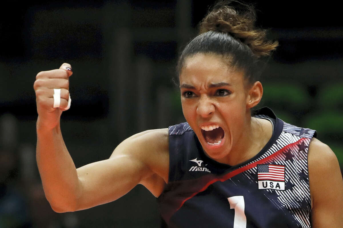 United States’ Alisha Glass celebrates during a women’s bronze medal volleyball match against the Netherlands at the 2016 Summer Olympics in Rio de Janeiro, Brazil, Saturday, Aug. 20, 2016.