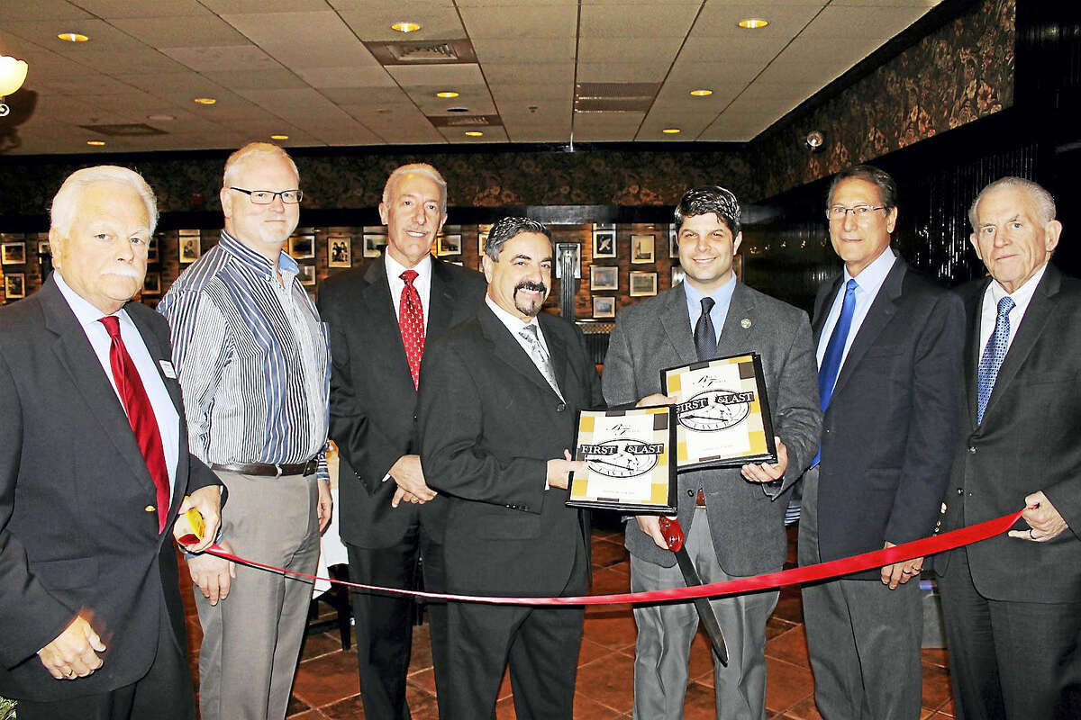 First and Last Tavern held a grand reopening in Middletown Dec. 8. Pictured from left are: Middletown Small Business Development Counselor Paul Dodge, Central Business Bureau Chairman Tom Byrne, Middletown Probate Judge Joseph D. Marino, First and Last Middletown Owner Tony Scacca, Middletown Mayor Dan Drew, Middletown Councilman Tom Serra and President of the Middlesex County Chamber of Commerce Larry McHugh.