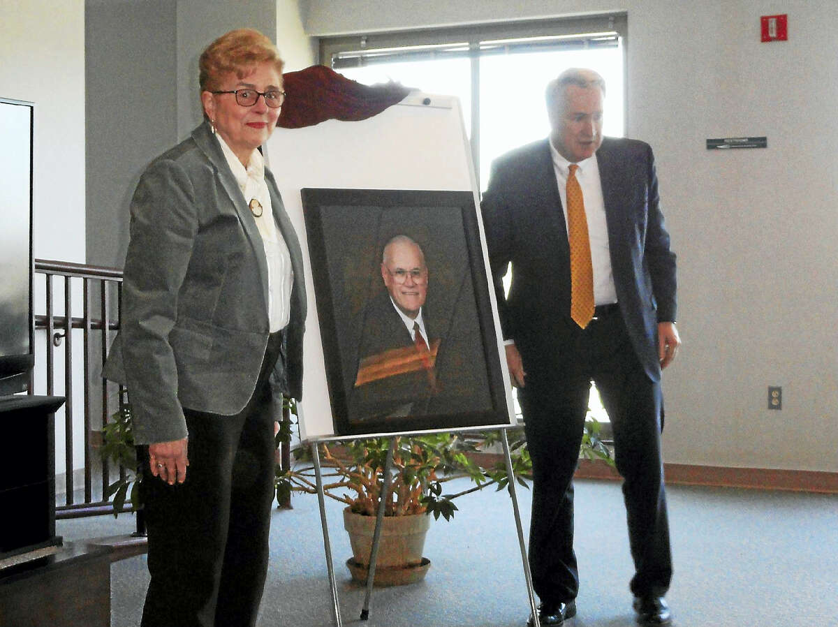 Sue Redway and Middlesex County State’s Attorney Peter McShane unveil the portrait.