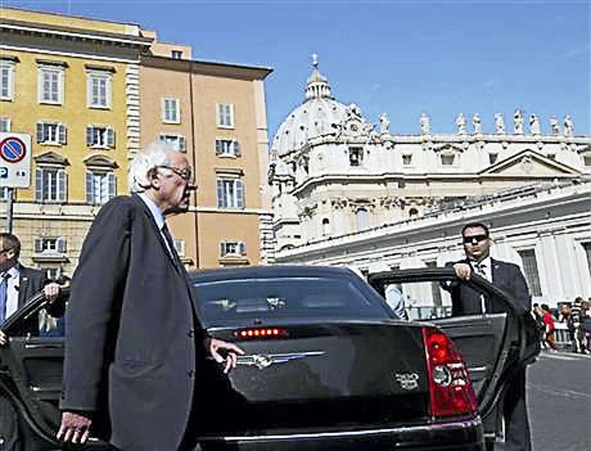 US presidential candidate Bernie Sanders arrives on a hotel terrace near the Vatican to meet reporters, Saturday, April 16, 2016. Democratic presidential candidate Bernie Sanders says in an interview with The Associated Press that he met with Pope Francis. Sanders says the meeting took place Saturday morning before the pope left for his one-day visit to Greece. He says he was honored by the meeting, and that he told the pope he appreciated the message that he is sending the world about the need to inject morality and justice into the world economy. Sanders says it’s a message he has been sending as well.