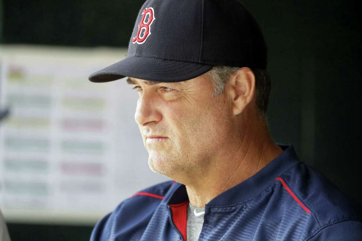 Red Sox manager John Farrell looks on from the dugout in Detroit.