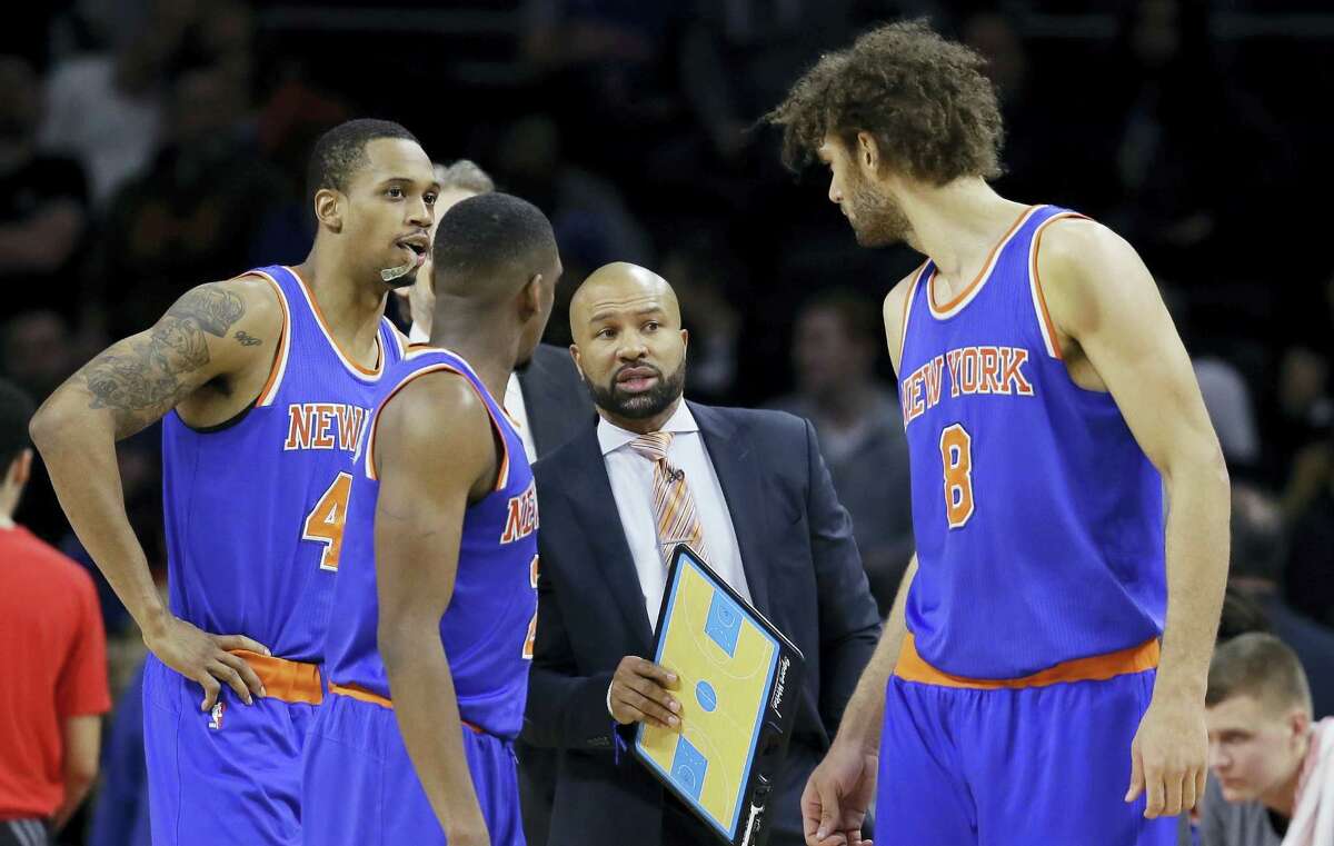 FILE - In this Thursday, Feb. 4, 2016, file photo, New York Knicks head coach Derek Fisher talks to his team during the first half of an NBA basketball game against the Detroit Pistons, in Auburn Hills, Mich. Fisher was fired as New York Knicks coach Monday, Feb. 8, 2016, with his team having lost five straight and nine of 10 to fall well back in the Eastern Conference playoff race. (AP Photo/Carlos Osorio, File)
