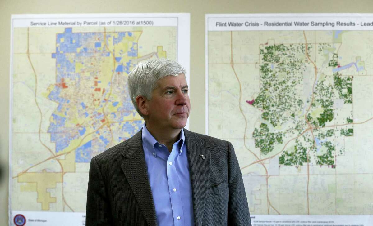 In this Feb. 18, 2016, file photo, Gov. Rick Snyder addresses the media in Flint, Mich. Michigan would have the toughest lead-testing rules in the nation and require the replacement of all underground lead service pipes in the state under a sweeping plan Gov. Rick Snyder and a team of water experts are unveiling Friday, April 15, 2016, in the wake of Flint’s water crisis.