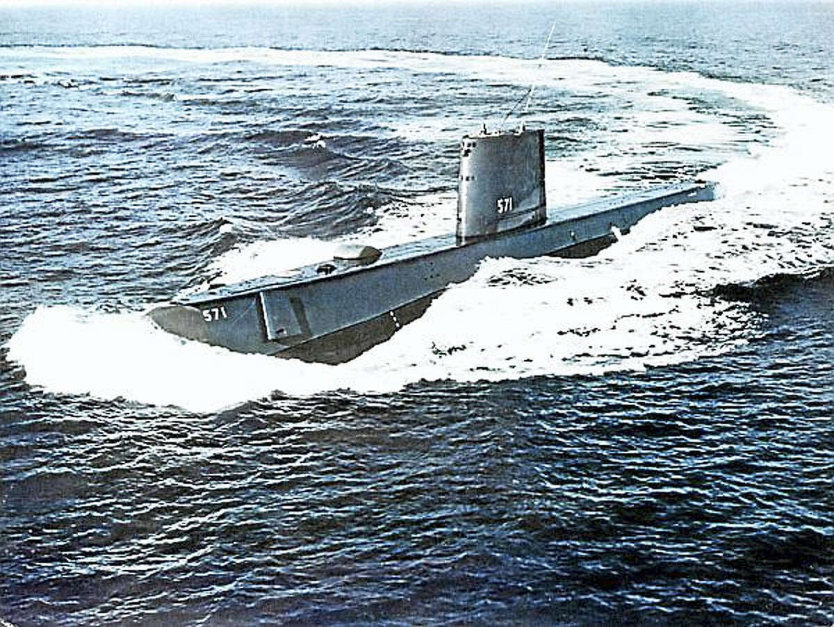 USS NAUTILUS (SSN 571) making a tight full-speed turn while on sea trials.