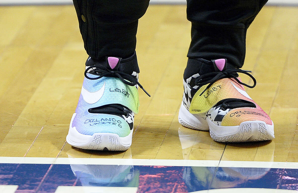The shoes of New York Liberty’s Shavonte Zellous are marked with “Orlando United” before Thursday’s game against the Connecticut Sun in Uncasville, Conn. Zellous is an Orlando, Fla., native and her sister had been at the Pulse nightclub the weekend before the mass shooting.