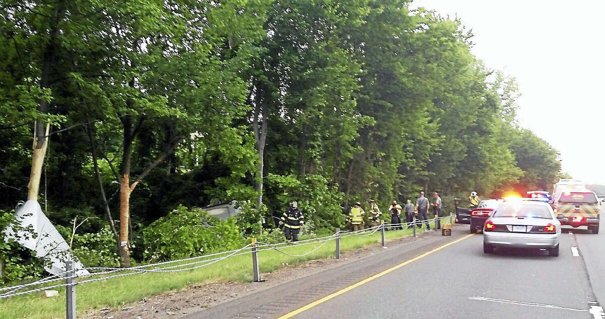 Traffic was backed up for miles on Interstate 91 northbound in Cromwell early Thursday after a box truck rolled over and crashed into some woods near the highway.