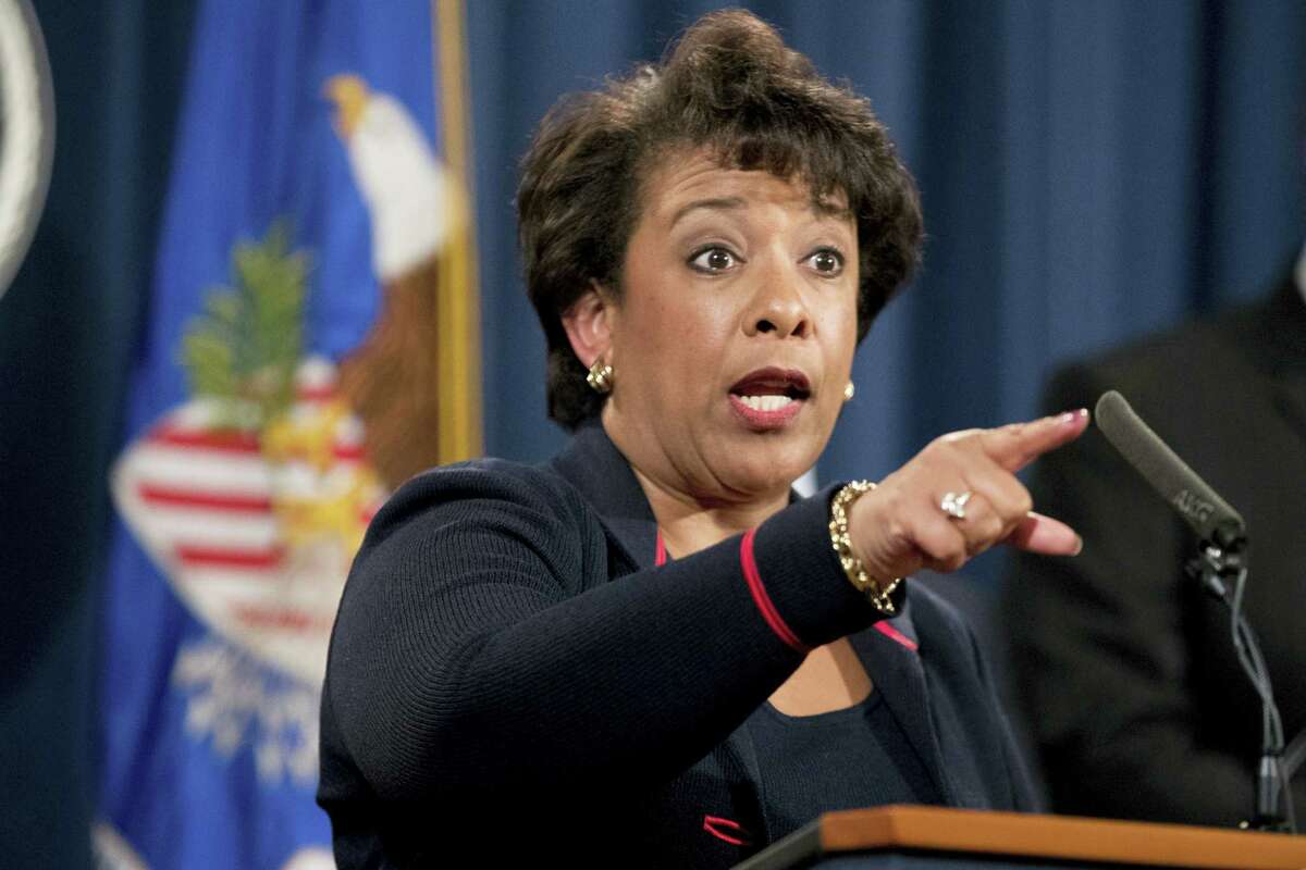 In this file photo Attorney General Loretta Lynch takes a question during a news conference at the Justice Department in Washington. Hate crimes tear at the fabric of American communities and represent a stain on the country’s soul, Lynch said at a mosque and Muslim community center on Dec. 12. Lynch spoke at the All Dulles Area Muslim Society Center as law enforcement across the country confronts a spike in hate crimes targeting Muslims.