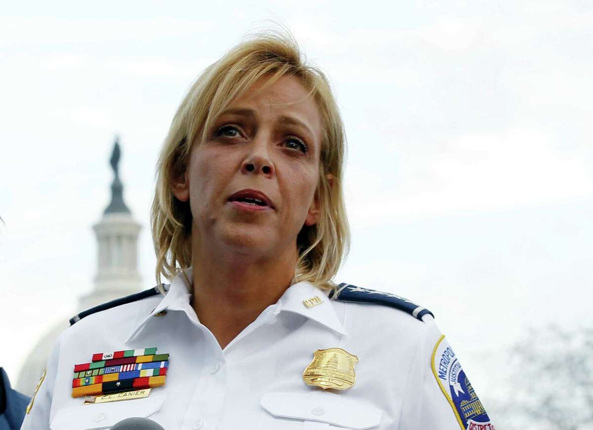 In this Oct. 3, 2013 photo, Washington Police Chief Cathy Lanier speaks on Capitol Hill in Washington. Lanier is stepping down to become head of security for the National Football League.