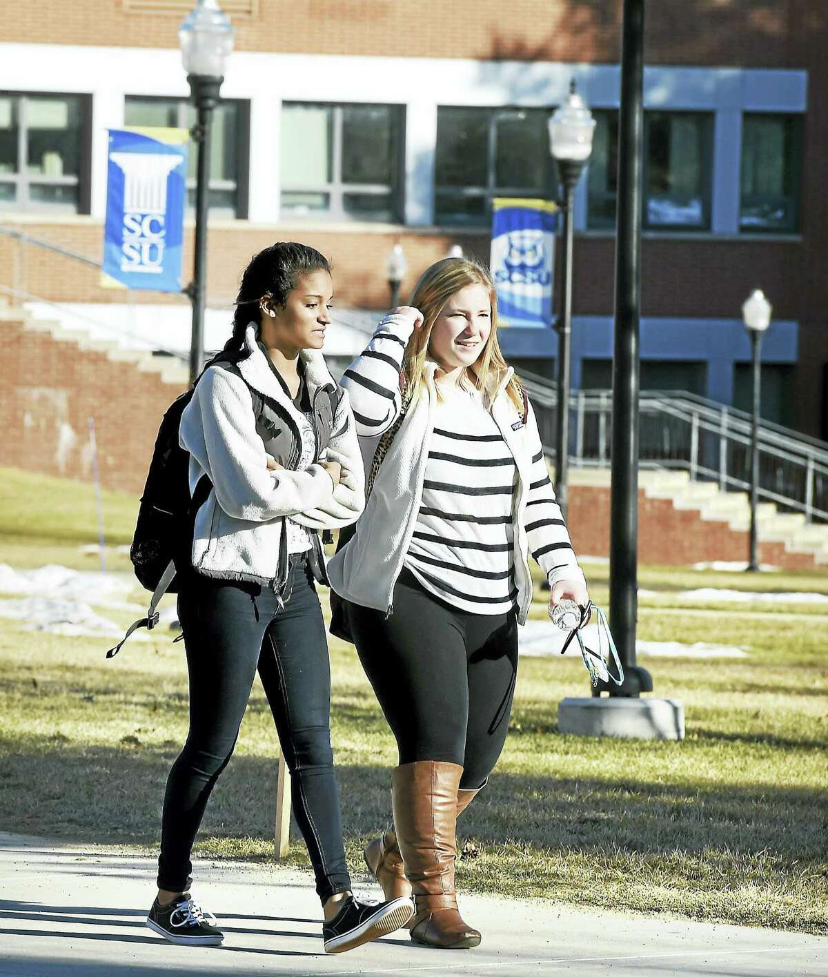 Students walk through the quad at Southern Connecticut State University in New Haven.