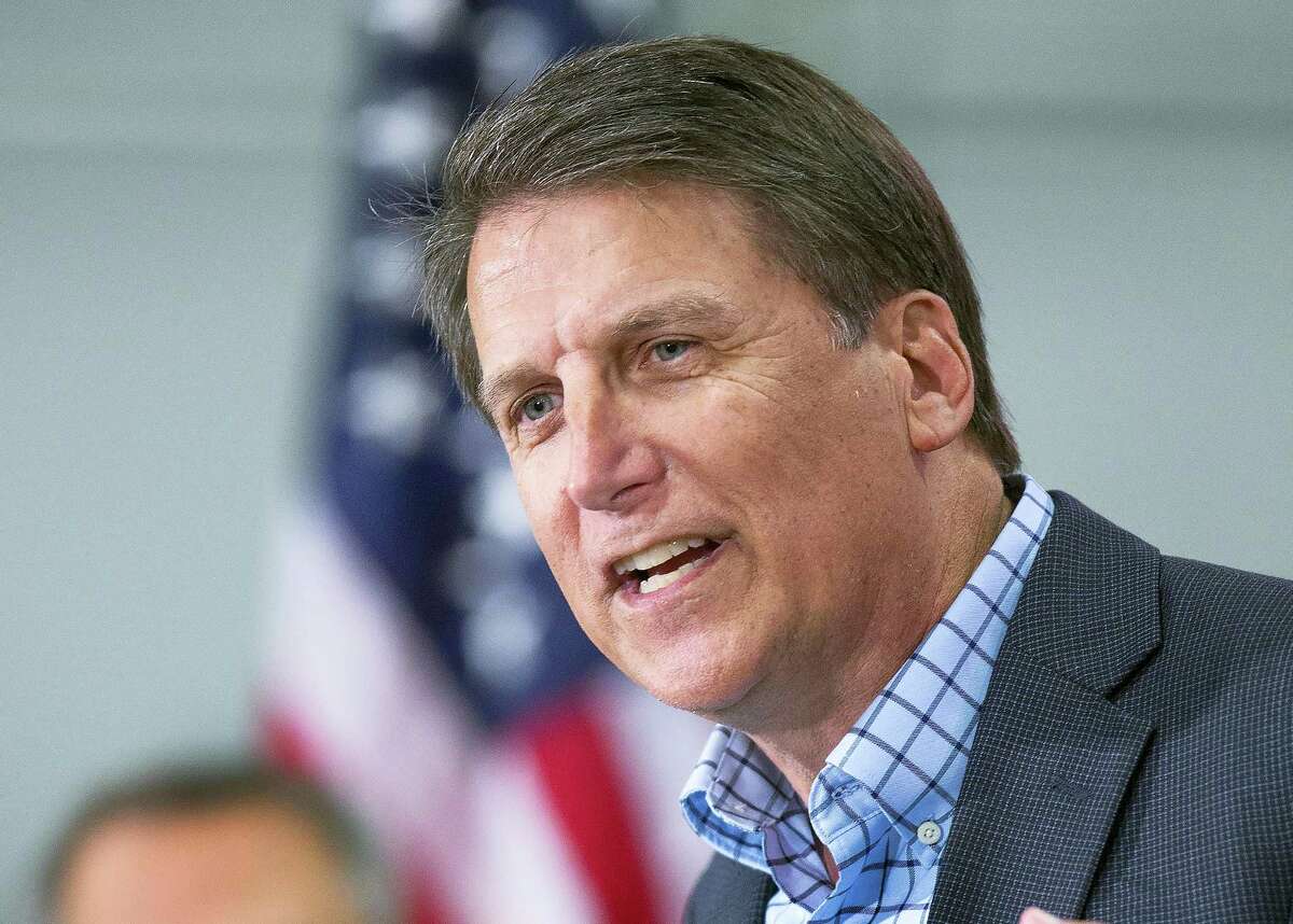 In this Dec. 2, 2015, file photo, North Carolina Gov. Pat McCrory kicks off his re-election campaign in Kernersville, N.C. McCrory said Tuesday, April 12, 2016, he wants to change a new state law that prevents people from suing over discrimination in state court, but he’s not challenging a measure regarding bathroom access for transgender people. His announcement comes as fallout widens over the law he signed last month that would limit protections for gay, lesbian and transgender people.