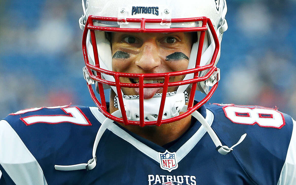 Tom Brady takes batting practice with Rob Gronkowski