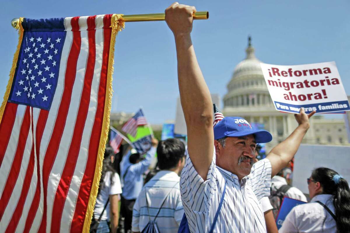 Rigoberto Ramos from Seaford, Del., originally from Guatemala, rallies for immigration reform in front of the U.S. Capitol in Washington.