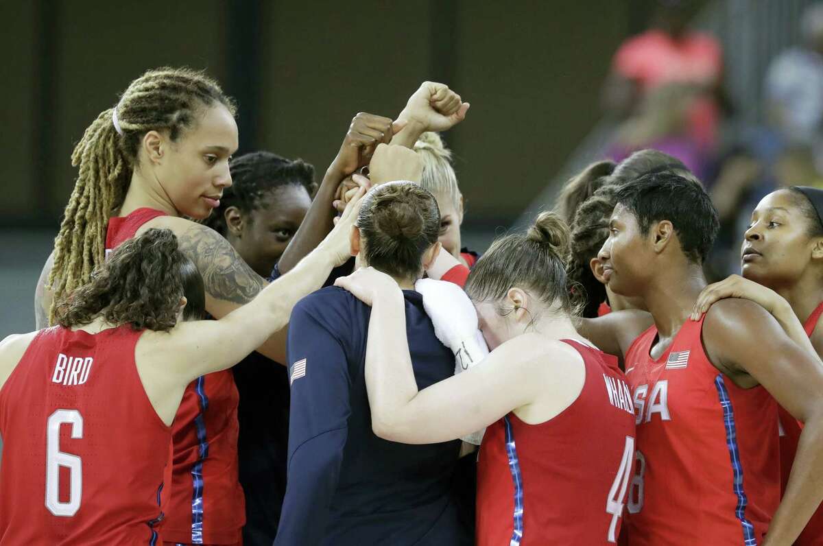 The United States women’s basketball team huddles at mid court after beating China on Saturday.